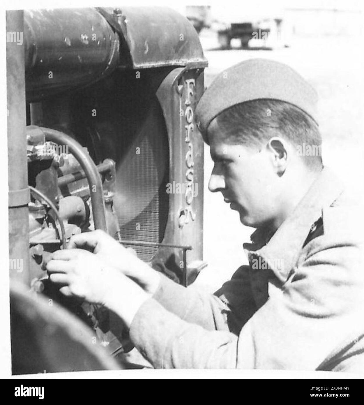 RELIEF FOR YUGOSLAVIA - A Yugoslav soldier starts maintenance on one of