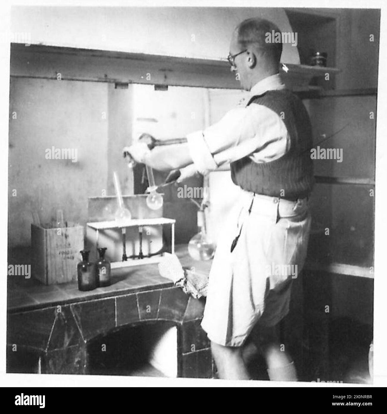 NORTH AFRICATESTING THE SOLDIERS' FOOD - Analysis of Foods 5. First stage in testing for metallic contamination of tinned foods. Photographic negative , British Army Stock Photo