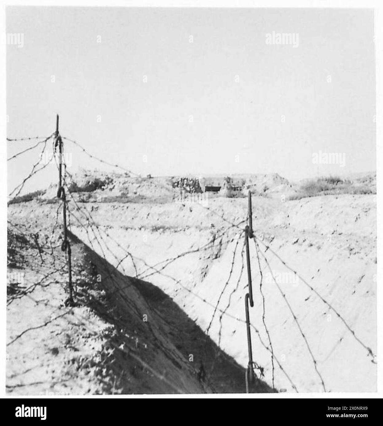 Photographic negative showing captured sections of the Mareth Line with the main road after Eighth Army operations, following enemy withdrawal. Stock Photo