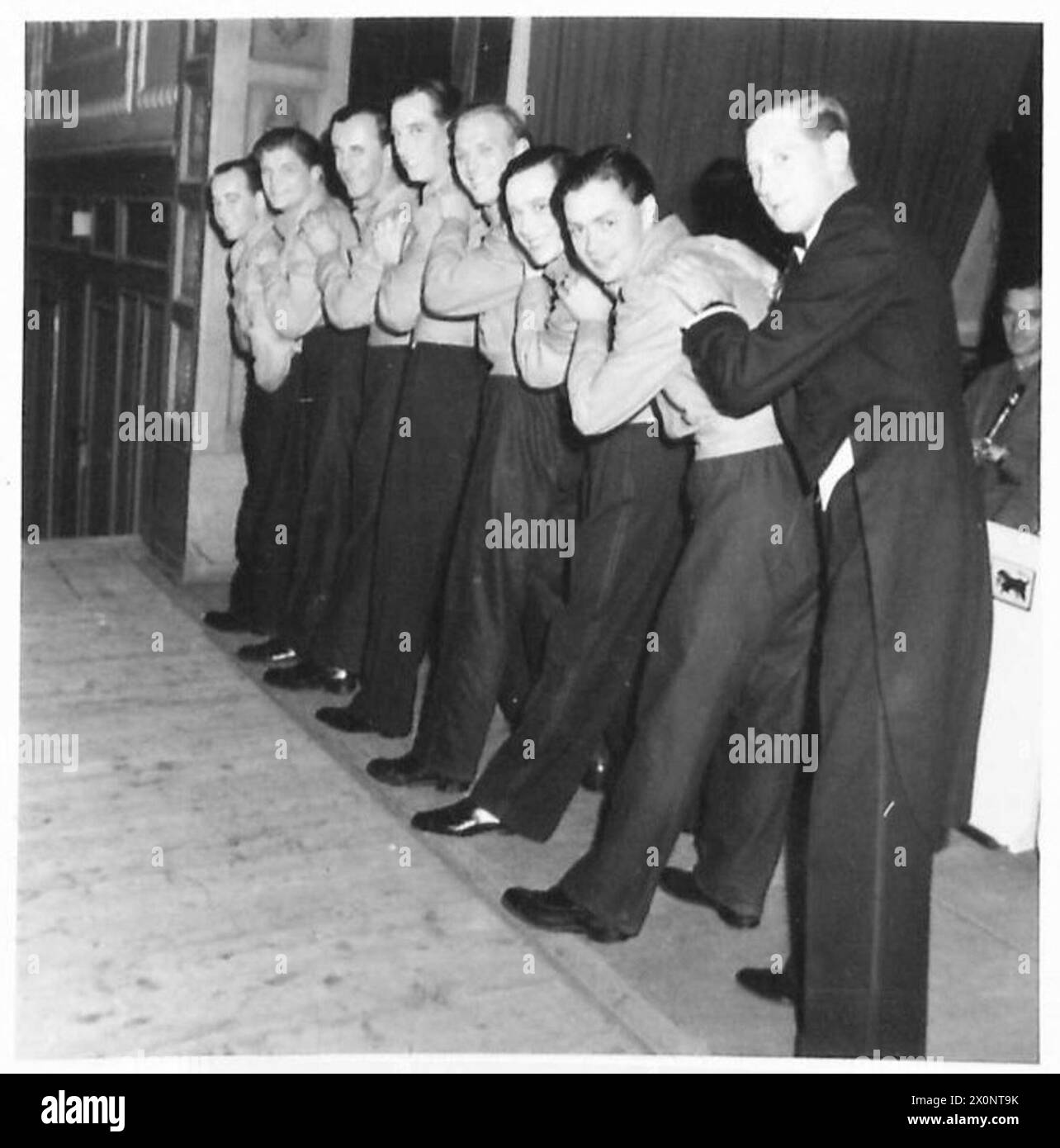 HAMBURG ENTERTAINMENTS - 11th Armoured Division concert party. Photographic negative , British Army, 21st Army Group Stock Photo