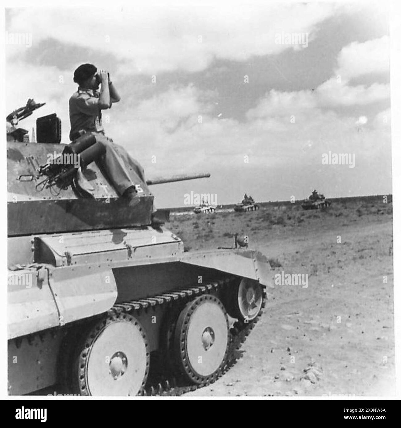 Commandeered A Tank A tank commander observes from his vehicle while advancing in the ...