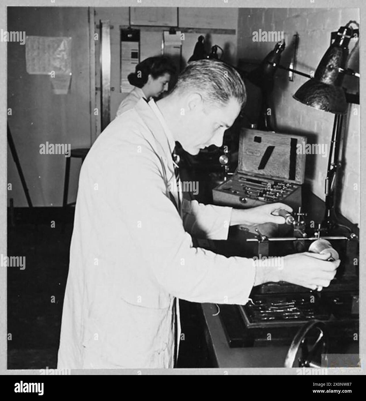 The Standards Room at the BOAC aircraft engine factory is shown in 1945 ...