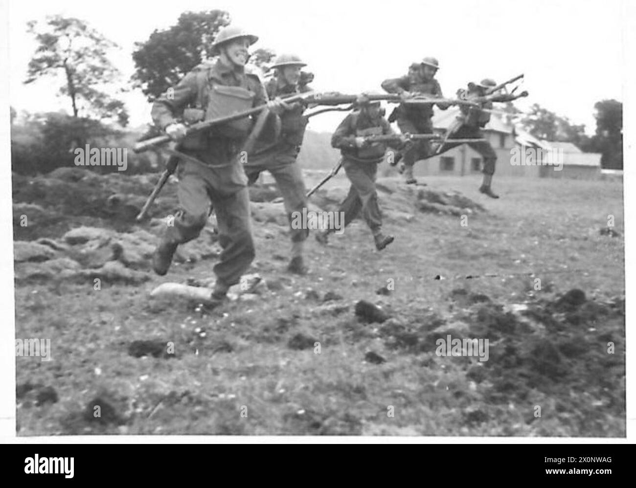 A forward movement in short rushes by troops during hardening exercises ...