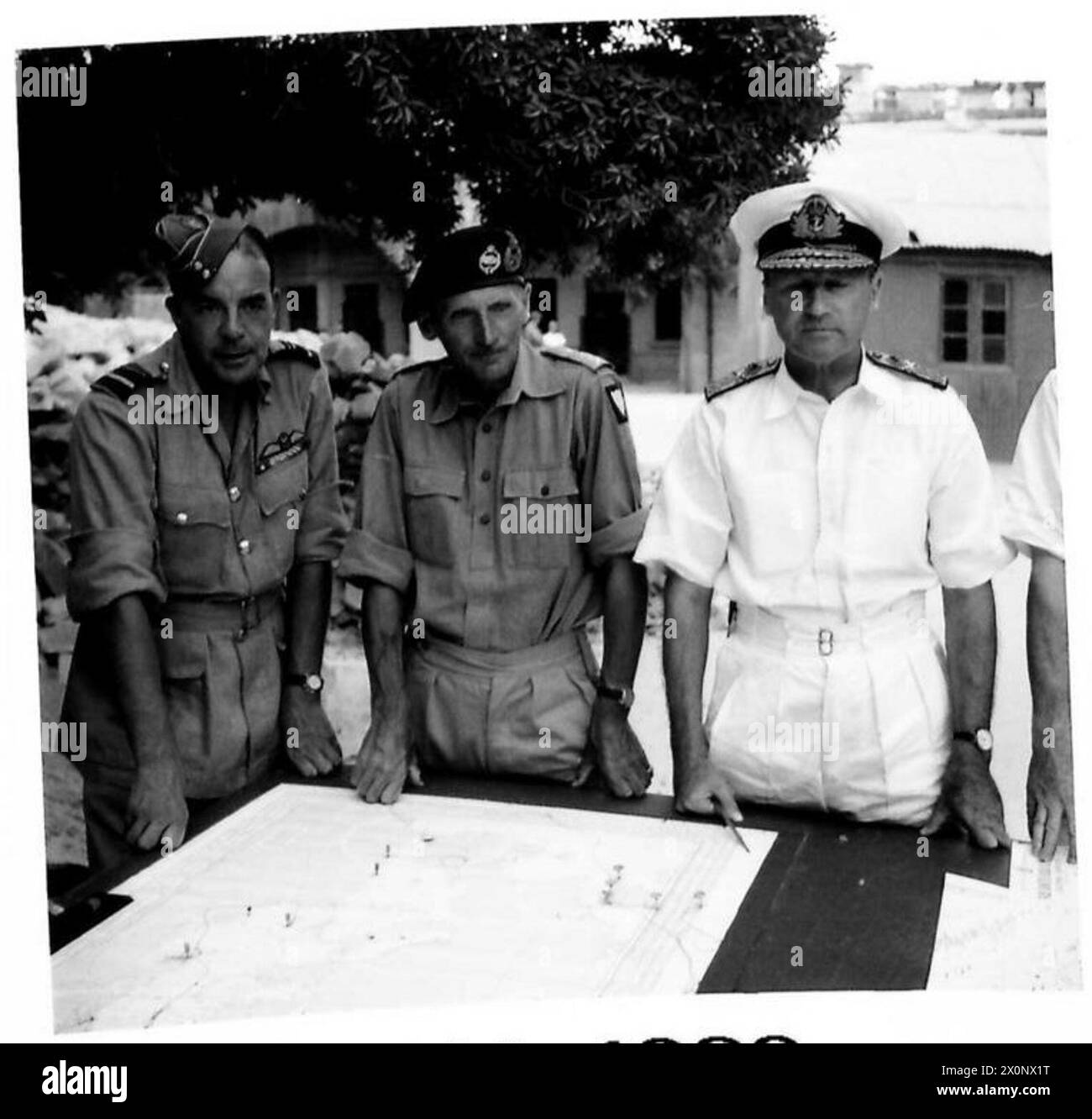 FINAL INVASION PREPARATIONS (IN MALTA) - Left to right:- Air Vice Marshal Broadhurst, General Montgomery and Admiral Sir B.H. Ramsay, KCB., MVO., Photographic negative , British Army Stock Photo