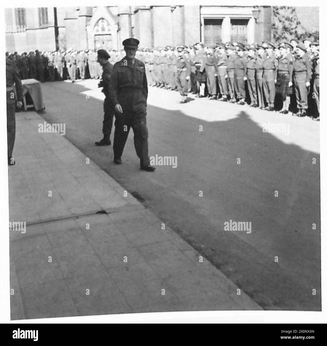 V.E.DAY PARADE OF 1ST CORPS - Lieutenant General Sir John Crocker leaving after the address. Photographic negative , British Army, 21st Army Group Stock Photo