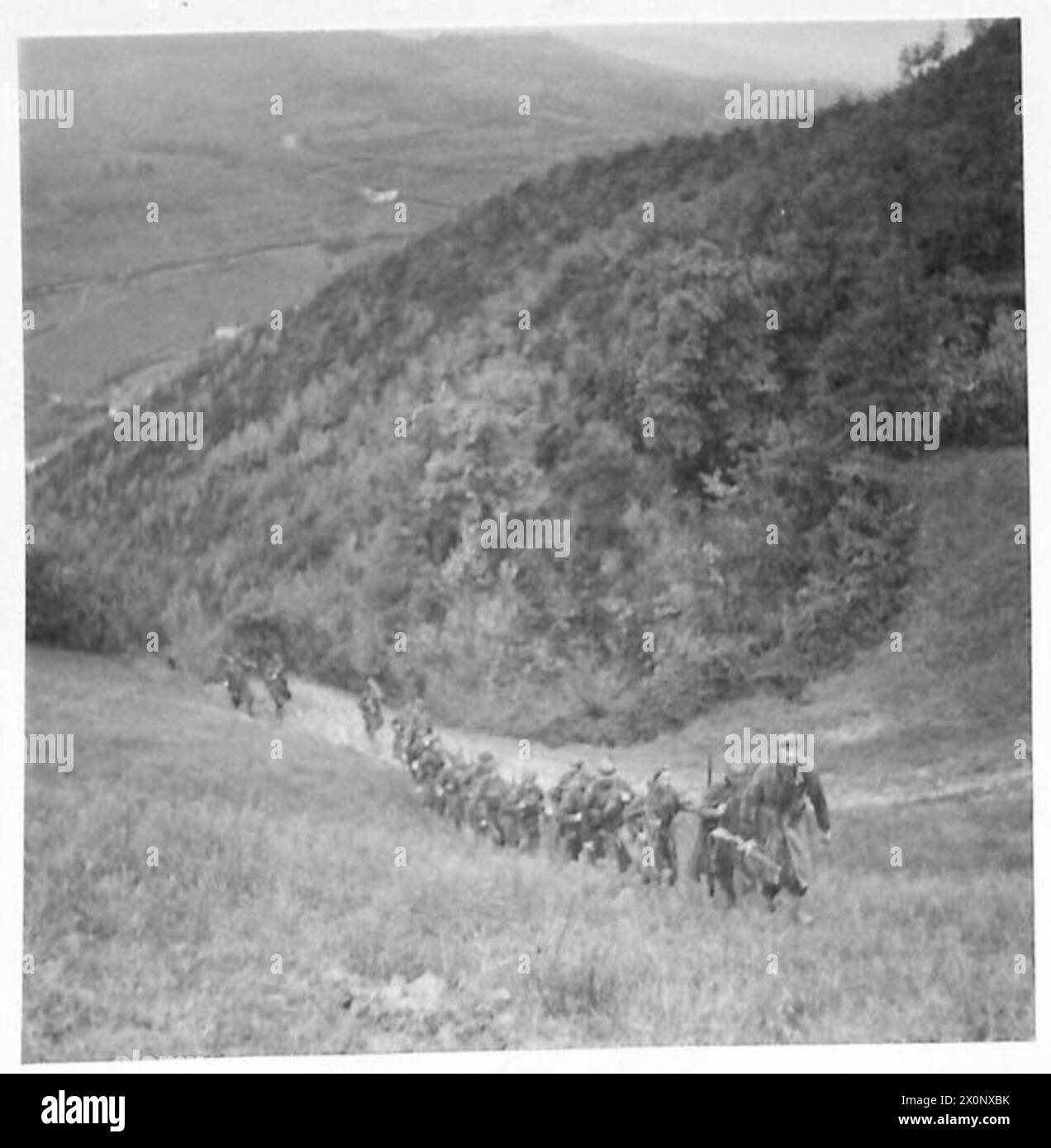 EIGHTH ARMY : BAD ROADS HAMPER SUPPLY TRAFFIC - The axis of advance of 20 Brigade, 10th Indian Division is only a very bad second class road, and two lines of traffice can barely pass. Photographic negative , British Army Stock Photo