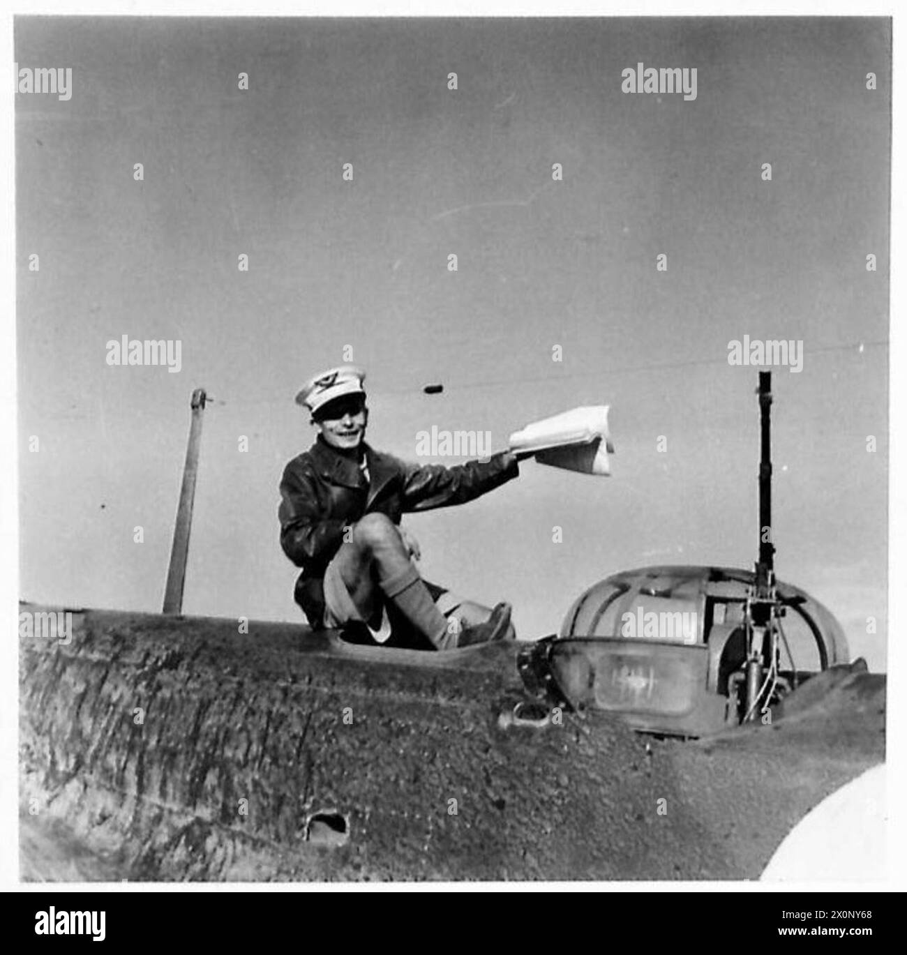 PICTURES FROM ABYSSINIA - Air Gunner Delgrosse, who is one of the crew of the plane. Photographic negative , British Army Stock Photo
