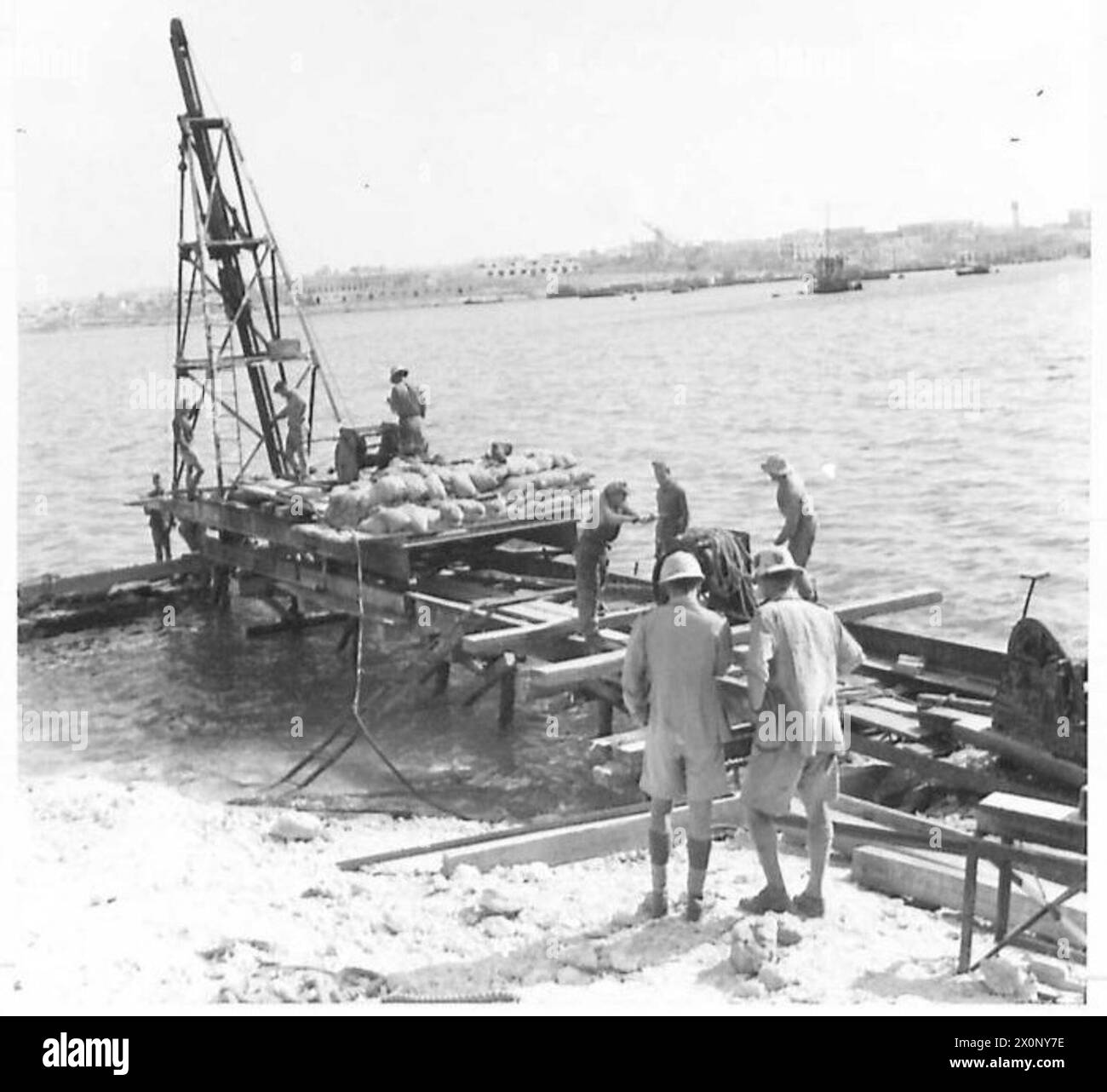 Palestinian units in Tobruk, Western Desert, are constructing a jetty ...