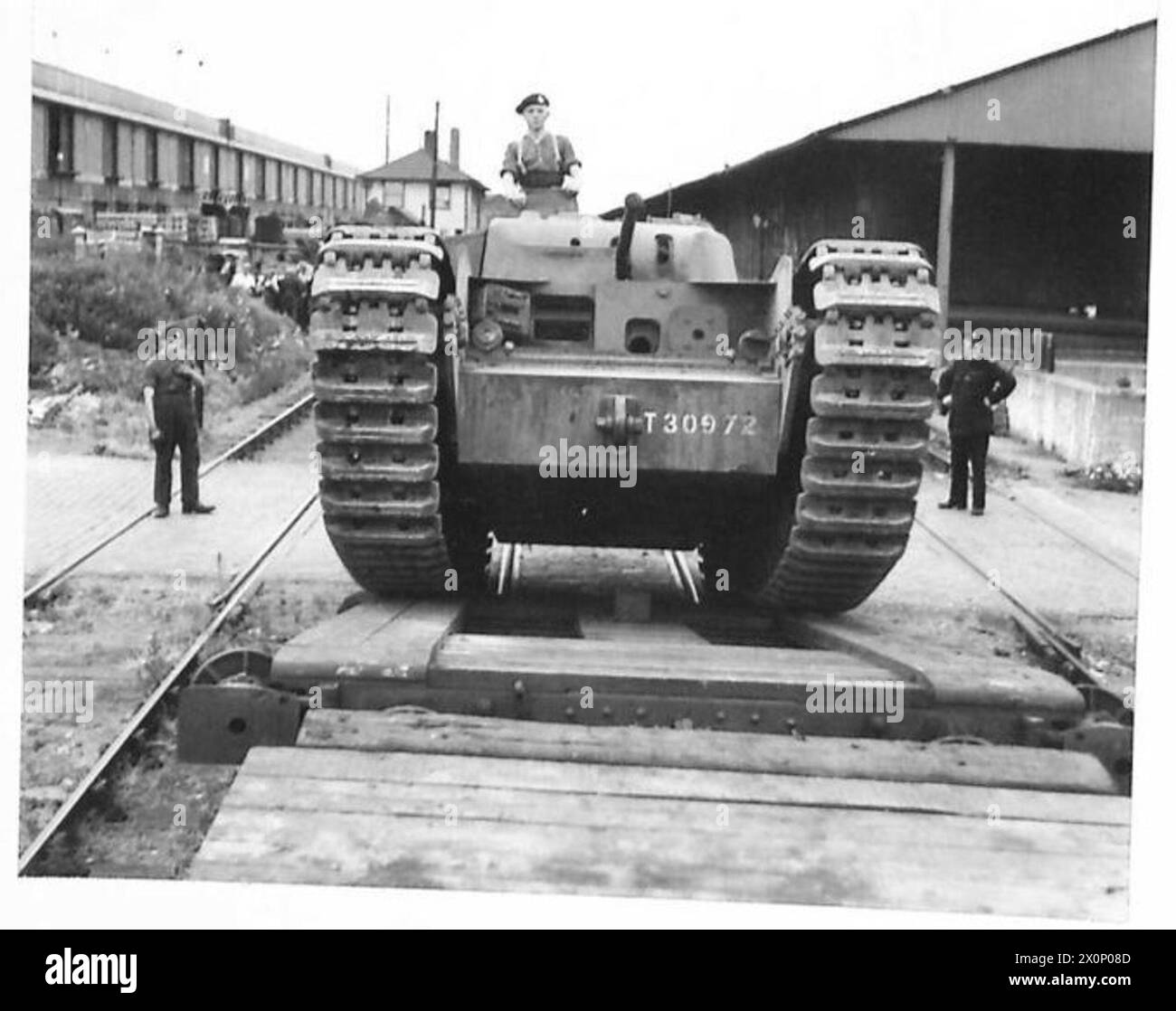 negative Tank going up ramp on to railway car under own power