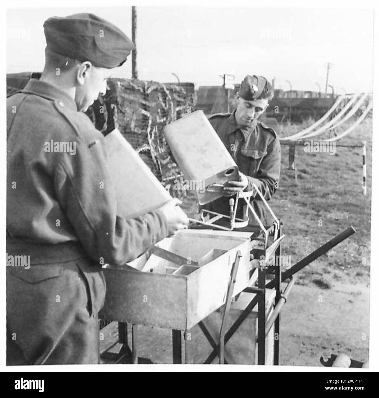 PHOTOGRAPHS TAKEN AT A MOBILE PETROL FILLING CENTRE R.A.S.C. - Showing washing machine and draining trough Photographic negative , British Army Stock Photo