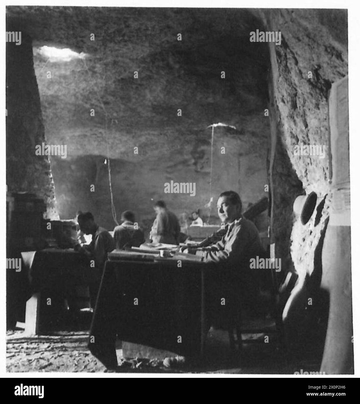 THE POLISH ARMY IN THE SIEGE OF TOBRUK, 1941 - Staff officers of the Polish Independent Carpathian Rifles Brigade at work in the Brigade headquarters placed in a big underground cave Polish Army, Polish Armed Forces in the West, Independent Carpathian Rifles Brigade, Rats of Tobruk Stock Photo