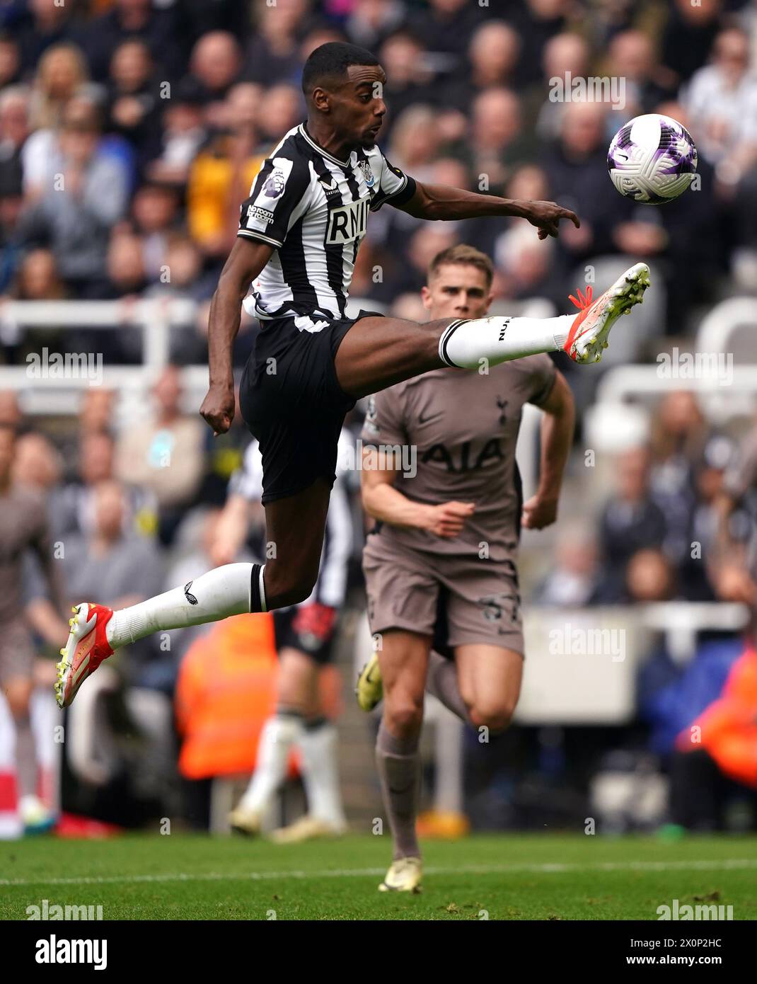 Newcastle United's Alexander Isak controls the ball during the Premier League match at St James' Park, Newcastle upon Tyne. Picture date: Saturday April 13, 2024. Stock Photo