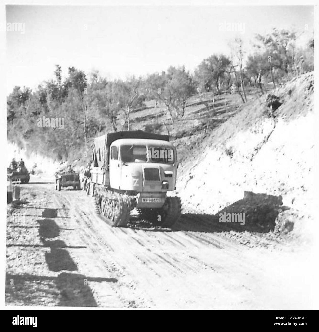 ITALY : EIGHTH ARMY - A captured German tracked vehicle being used to ...