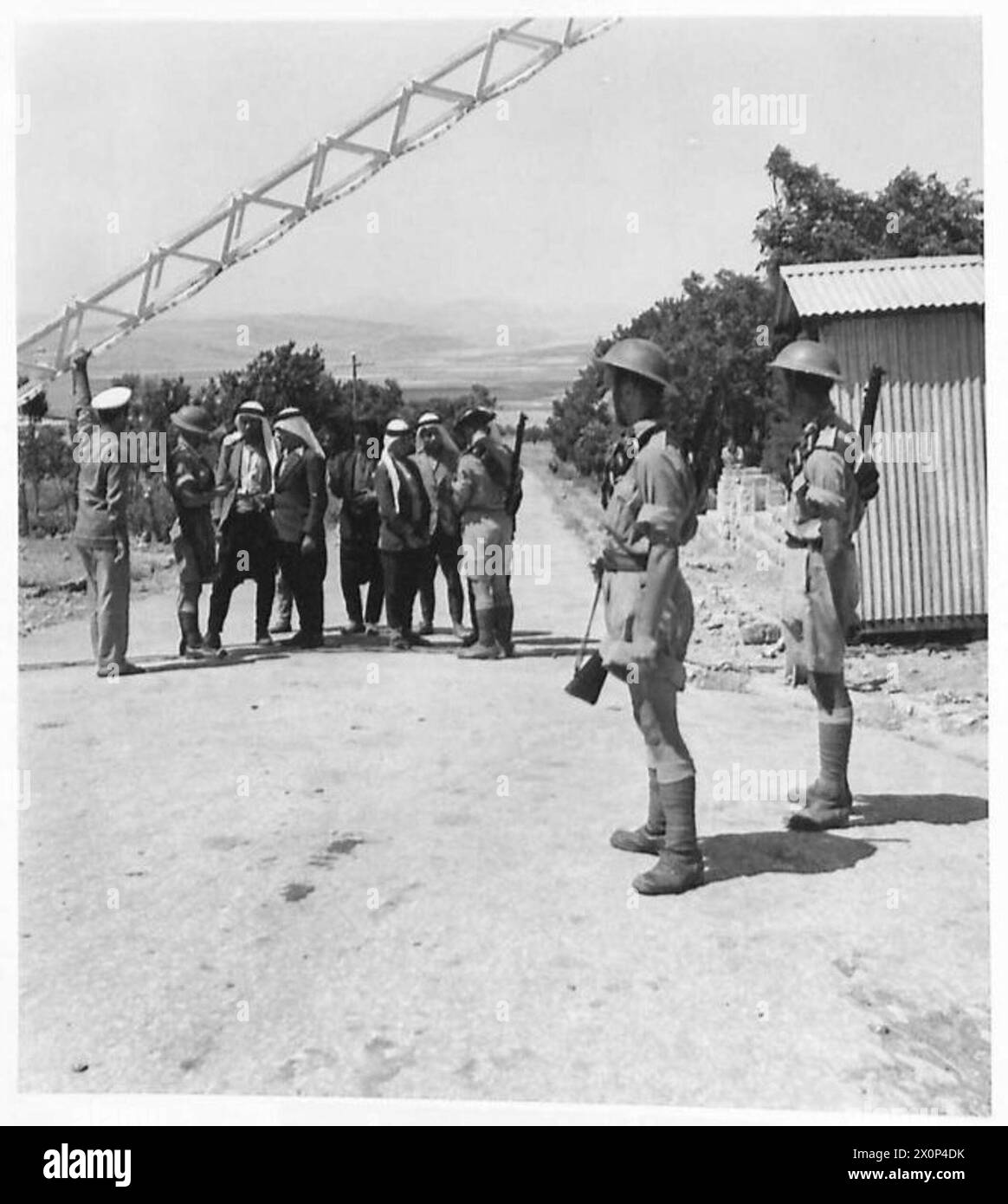 PICTURES TAKEN ON THE SYRIAN BORDER - Arabs being investigated at one of the frontier posts. Photographic negative , British Army Stock Photo