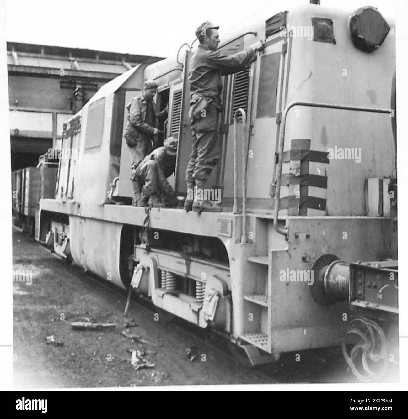 PHOTOGRAPHS OF PREFABRICATED PORT, ETC. - A.R.P. on Diesel loco Photographic negative , British Army, 21st Army Group Stock Photo