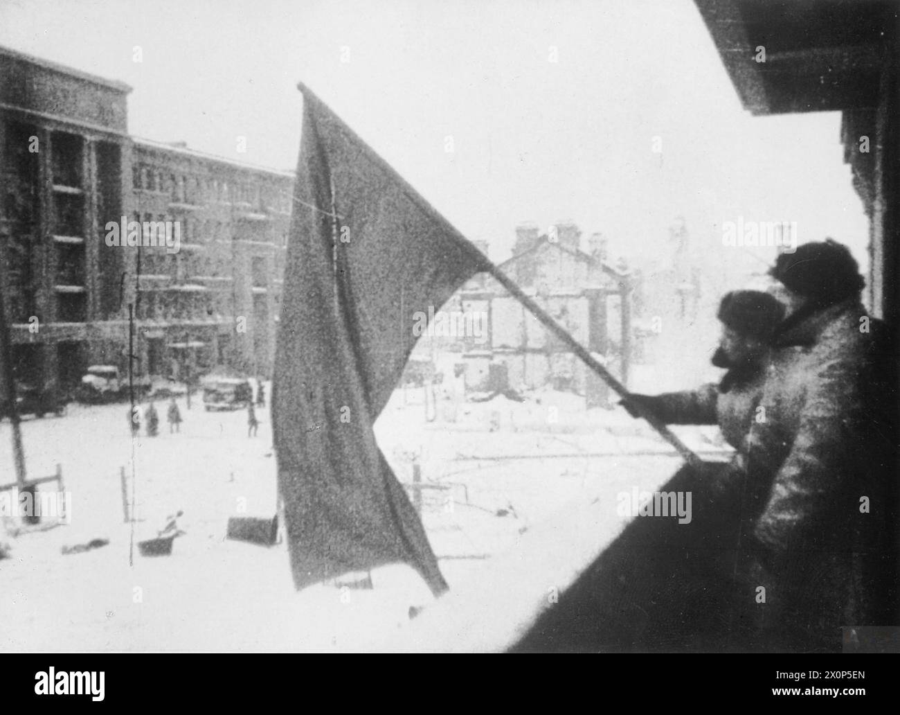 Russian soldiers hoist the Red Flag over a recaptured factory in ...
