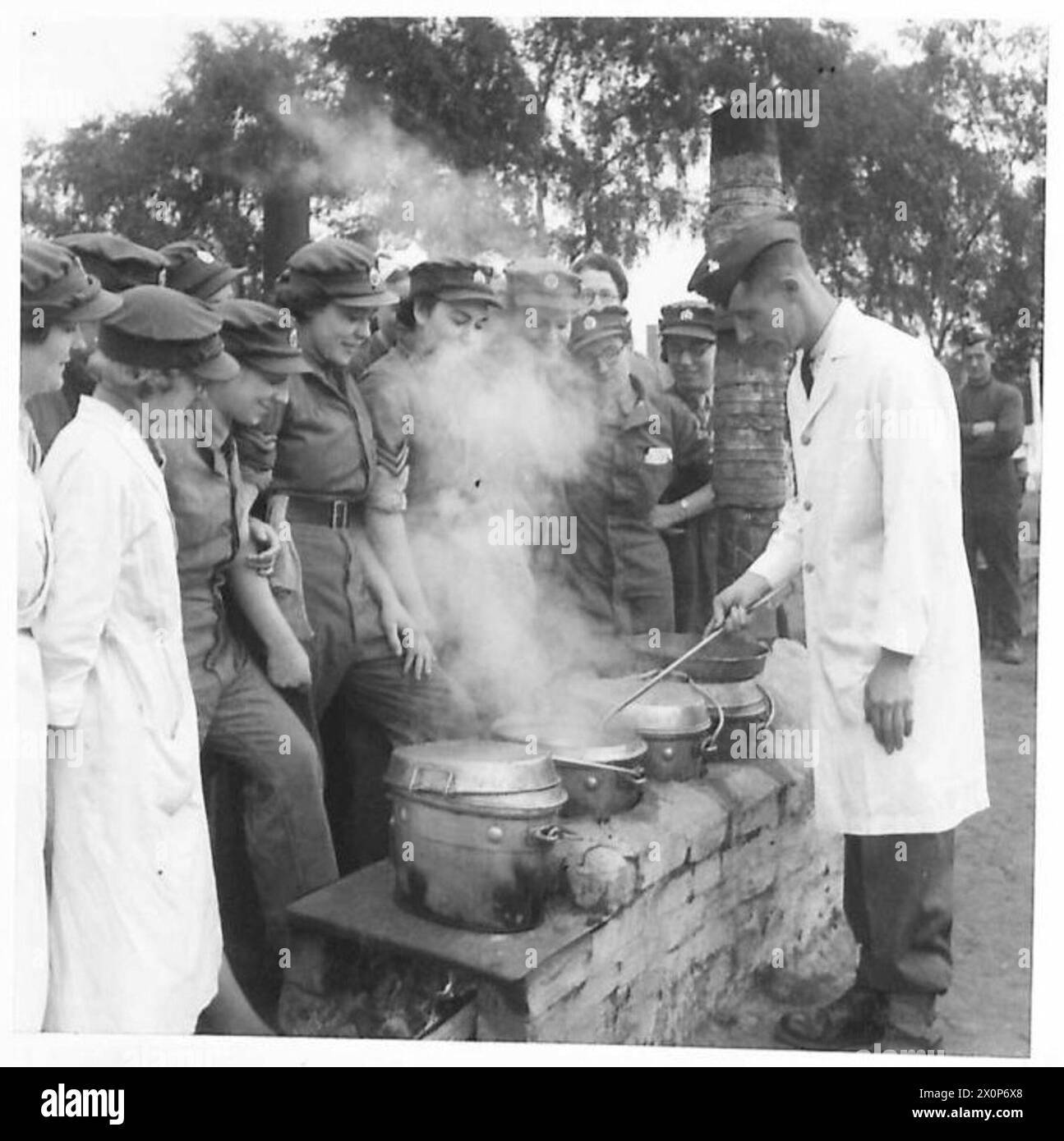 Members of the ATS are instructed in the use of a field oven during ...