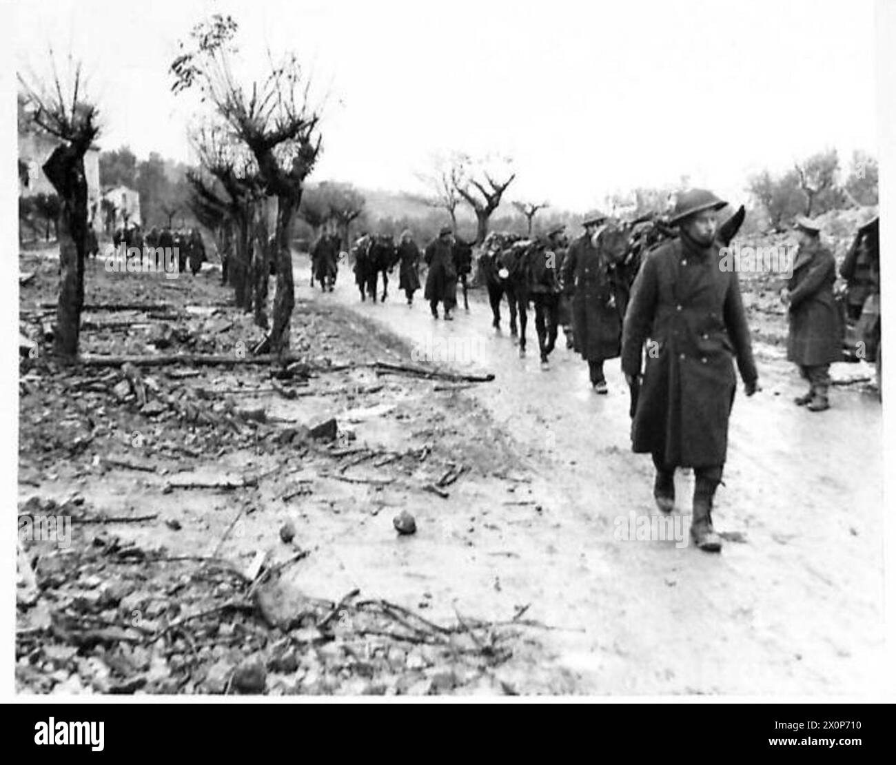ITALY : FIFTH ARMYTHE ASSAULT OF MOUNT CAMINO - A string of pack mules