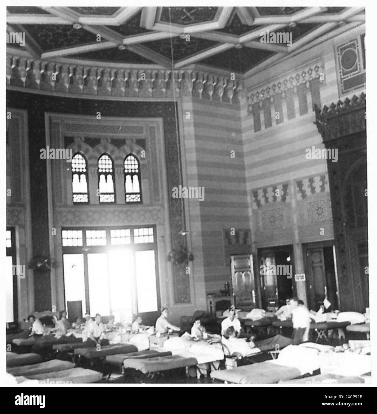 VADs AT 9TH GENERAL HOSPITAL - A general view of the one-time Casiono in the hotel, which has been coverted into a large ward. Photographic negative , British Army Stock Photo