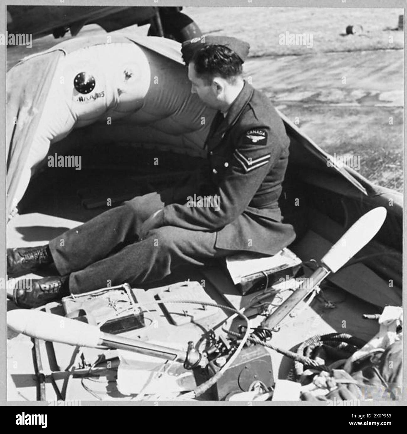 R.A.F's AIRBORNE LIFEBOATS : For story see CH.13910 - Picture (issued 1944) shows - The lifeboat life-lines which operate when the lifeboat touches the sea. Photographic negative , Royal Air Force Stock Photo