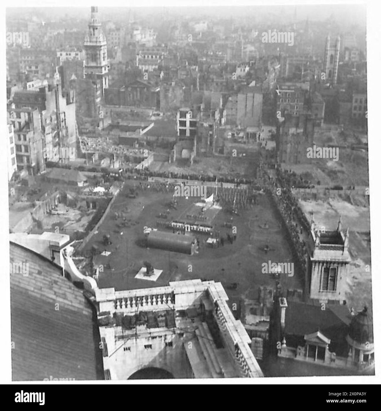 A.A. DEMONSTRATION SITE FOR 'SALUTE THE SOLDIER' WEEK - General Sir F.A. Pile, GOC-in-C A.A.Command yesterday [27.3.44] opened the Ack-Ack demonstration at St. Pauls site. This photograph taken from St. Pauls shows the opening ceremony of the Ack-Ack demonstration for 'Salute the Soldier' week. Photographic negative , British Army Stock Photo