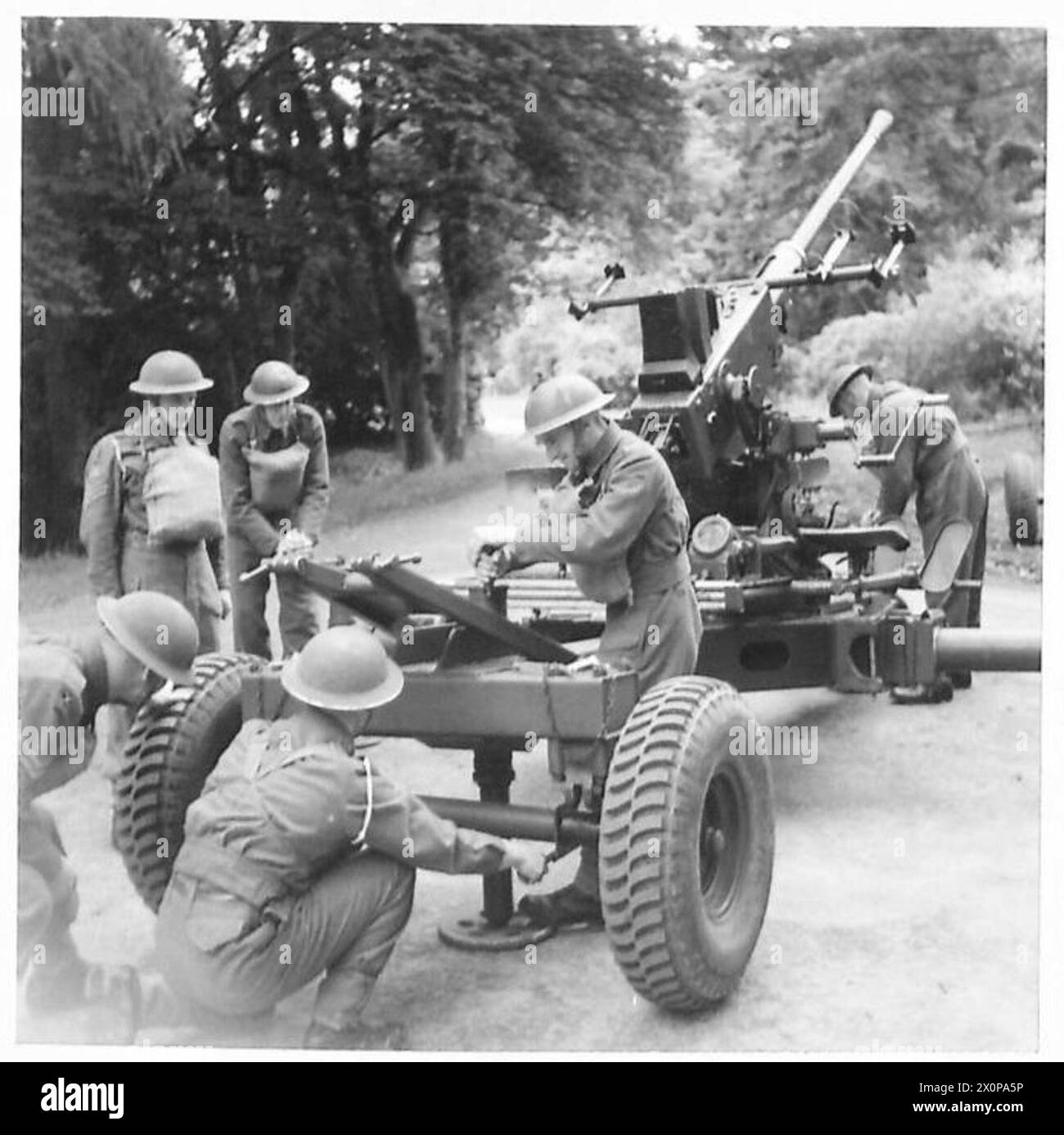 BOFORS GUNNERS IN TRAINING - The gun is taken out of action and made