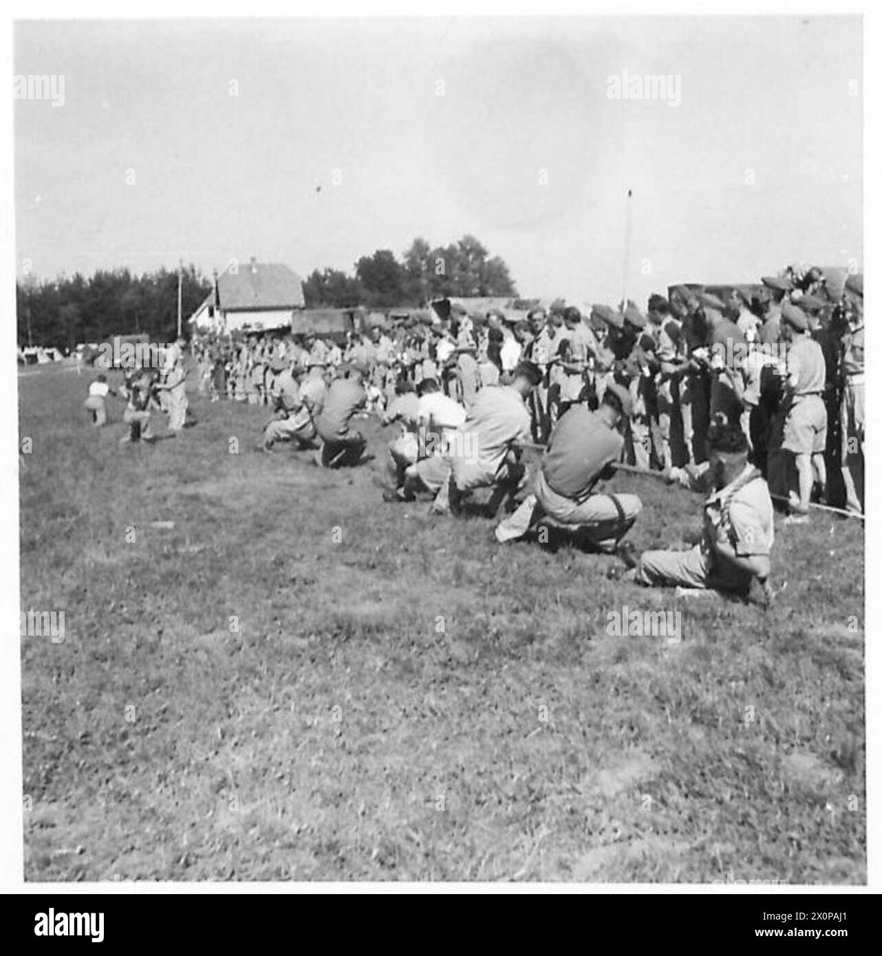 R.E.M.E. SPORTSPICTURES TO ILLUSTRATE OBSERVER STORY NO. 265 by CAPTAIN TRISTRAM - Two hefty teams having a good tussle during the tug-o-war event. Photographic negative , British Army Stock Photo