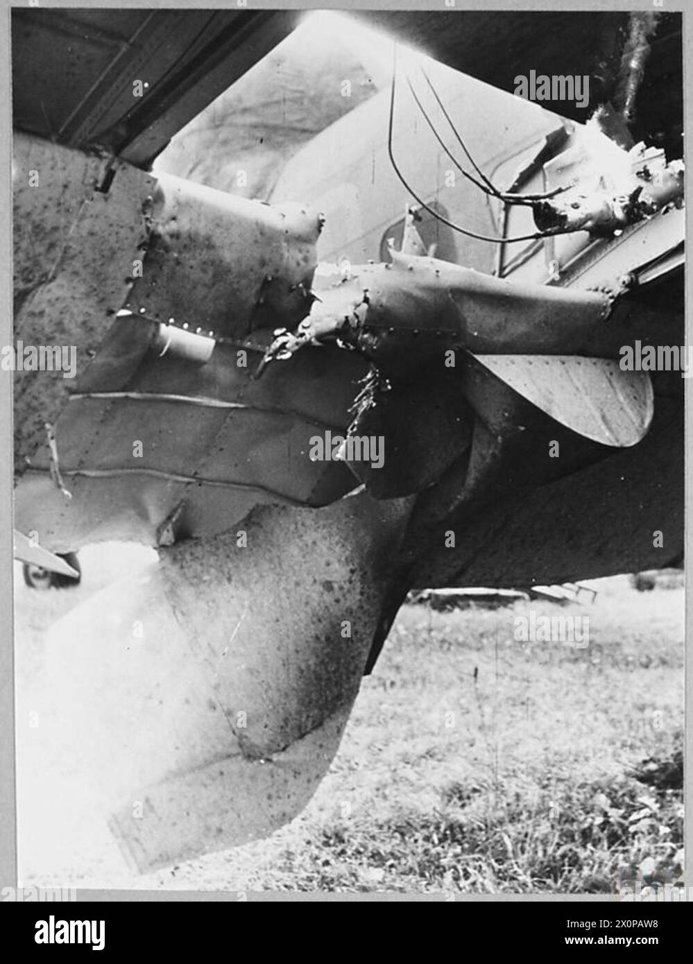 HUDSON ATTACKING GERMANY'S RUSSIAN SUPPLIES - HIT BUT SAFELY HOME (Picture issued 1942) - For story see CH.6720. Close-up of the great hole torn in the Hudson's starboard wing. Photographic negative , Royal Air Force Stock Photo