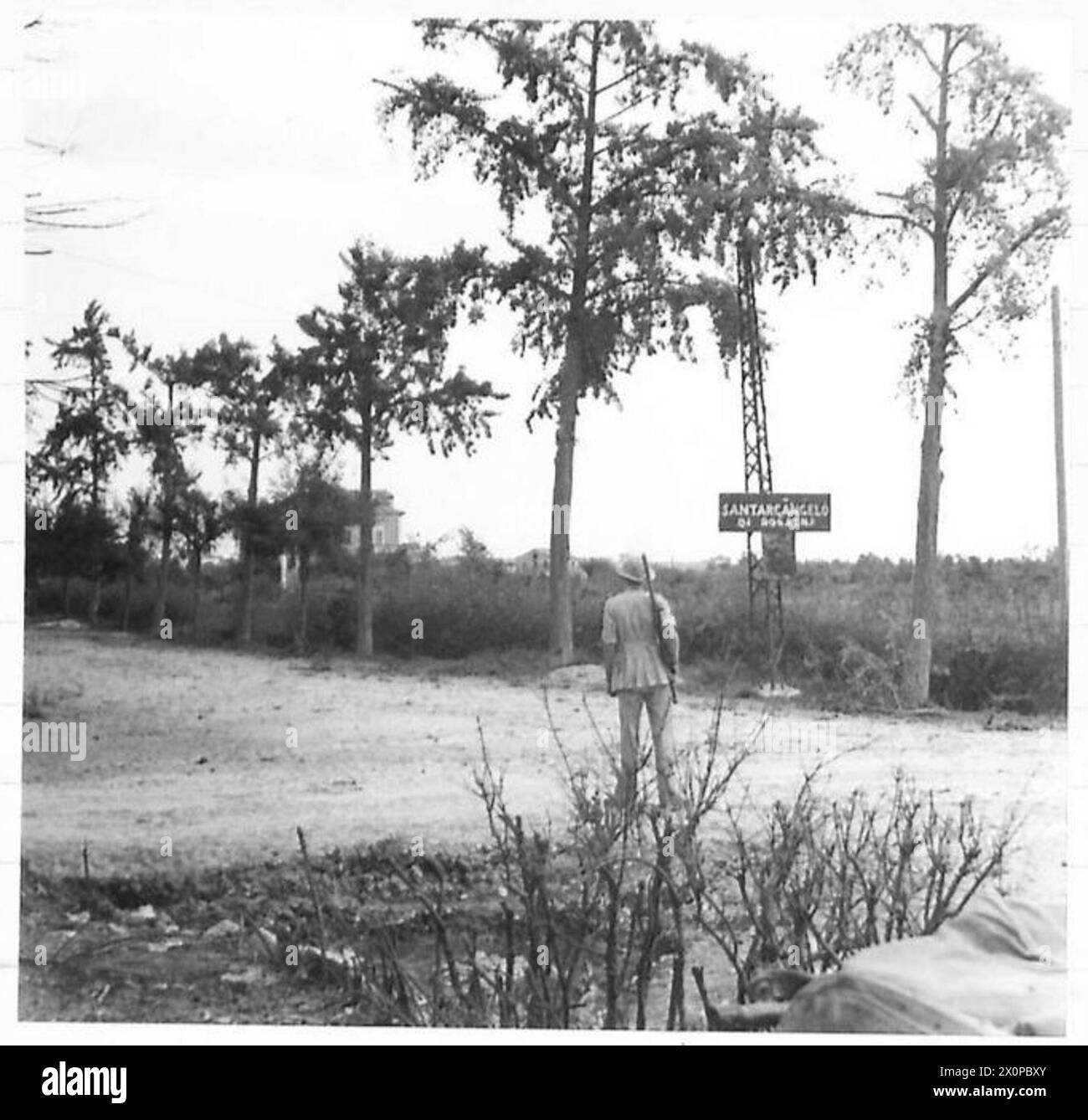 Gurkha troops of the British Eighth Army captured the entrance signboard to Santarcangelo during their advance across the River Marecchia. Stock Photo
