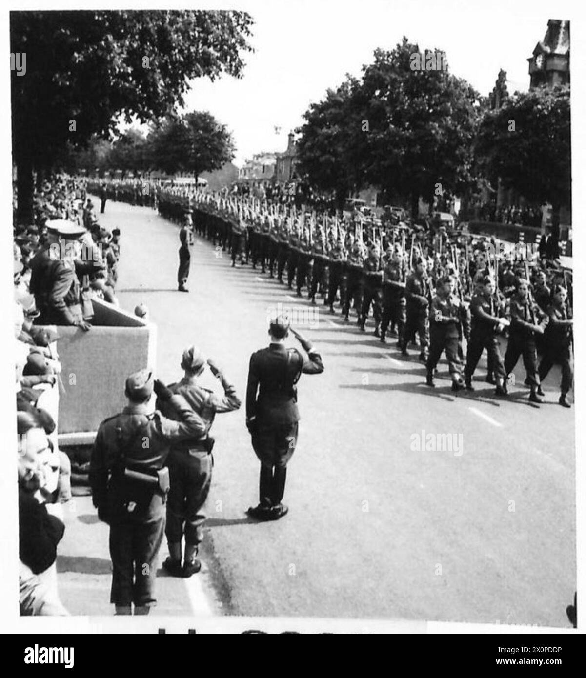 Photograph of 1st Rifle Brigade troops marching through Biggar during ...