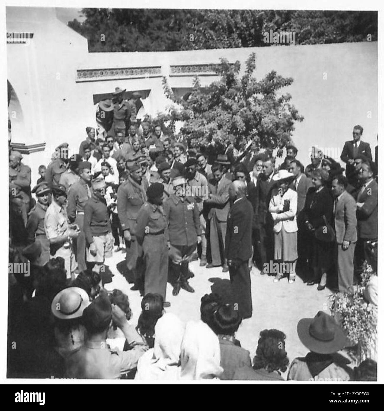General Montgomery, commander of the British Eighth Army, receives a formal welcome in Gabes, Tunisia, during the North African campaign of World War II. Stock Photo