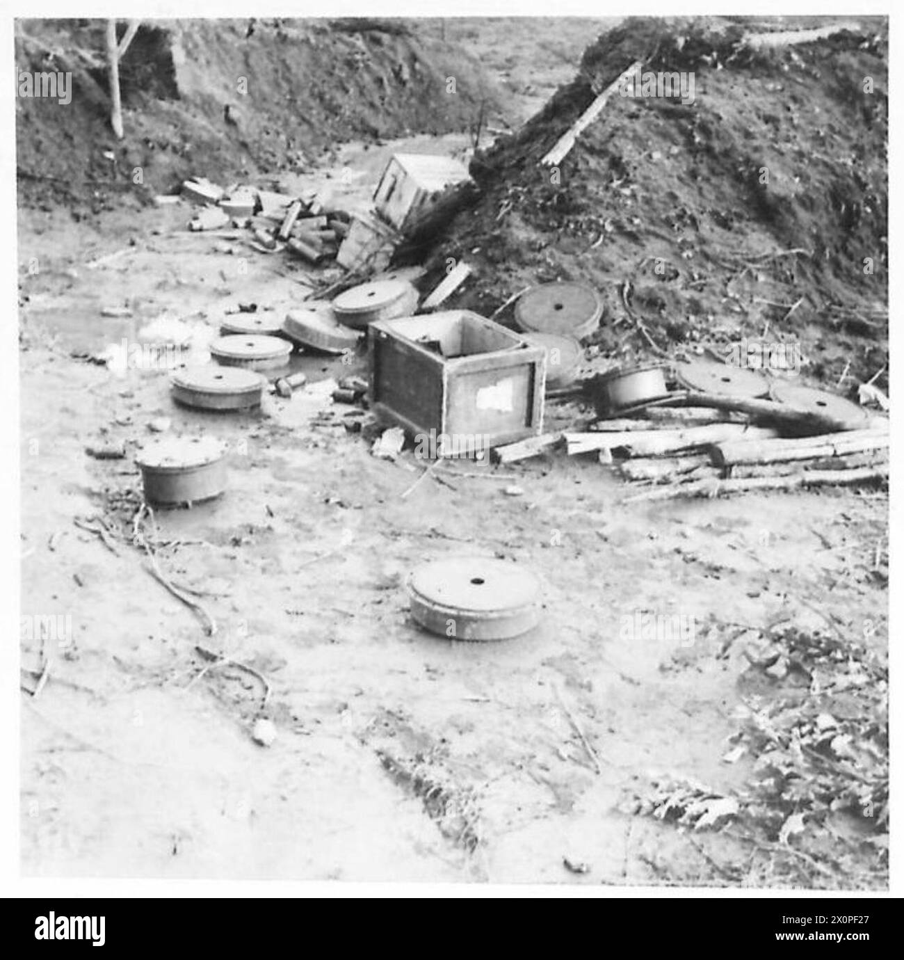 FIFTH ARMY : VARIOUS - Large-size Teller mines lying outside the dugout ...