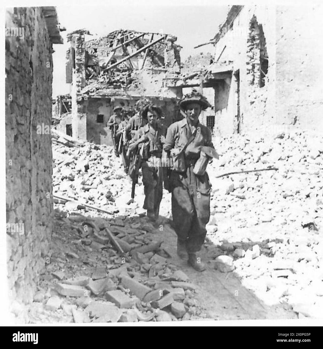 AFTER THE BATTLE FOR GEMMANO The moppingup party leaving the village