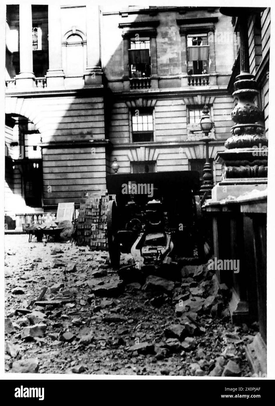 Damage caused by enemy air attacks is visible in Whitehall ...