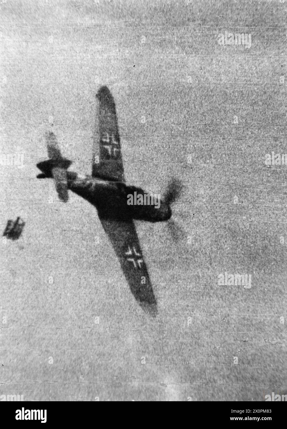 ROYAL AIR FORCE: ITALY, THE BALKANS AND SOUTH-EAST EUROPE, 1942-1945. - Still from camera gun footage shot from a Supermarine Spitfire flown by Warrant Officer B Bunting RAAF of No. 93 Squadron RAF, showing the cockpit canopy breaking away from a Messerschmitt Bf 109G after it had received fire from Bunting's aircraft over Italy. The pilot baled out shortly afterwards Royal Air Force, 93 Squadron, German Air Force (Third Reich) Stock Photo
