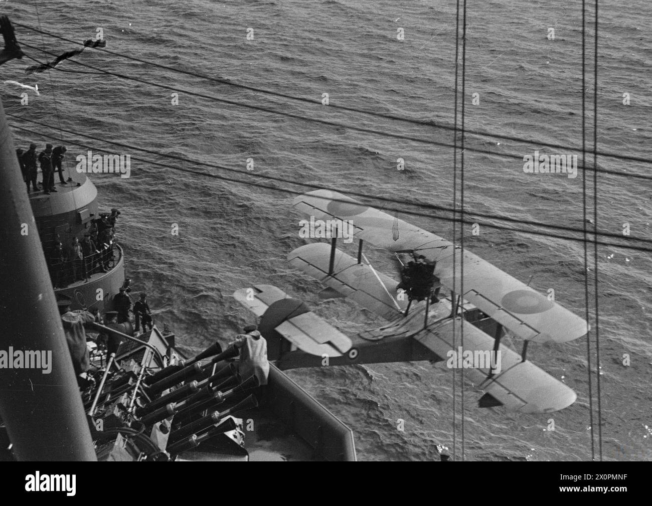 ON BOARD THE BATTLESHIP HMS PRINCE OF WALES. 1941. - A Supermarine Walrus aircraft being catapulted from HMS PRINCE OF WALES Stock Photo
