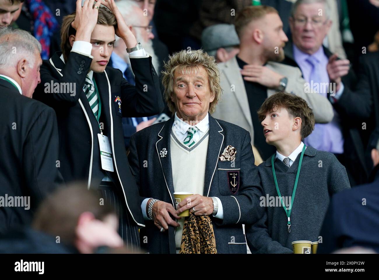 Rod Stewart (centre) attending the cinch Premiership match at Celtic Park, Glasgow. Picture date: Saturday April 13, 2024. Stock Photo