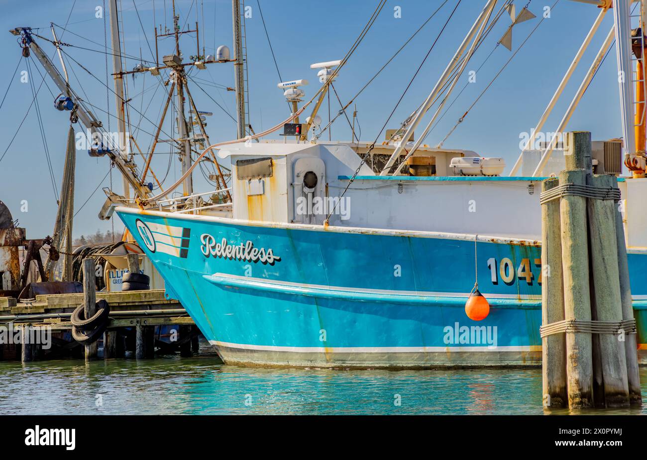 detail image of fishing boat, Relentless in dock in greenport, ny Stock