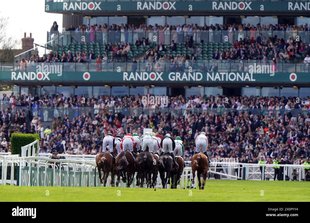 Runners and riders during the JRL Group Liverpool Hurdle on day three ...