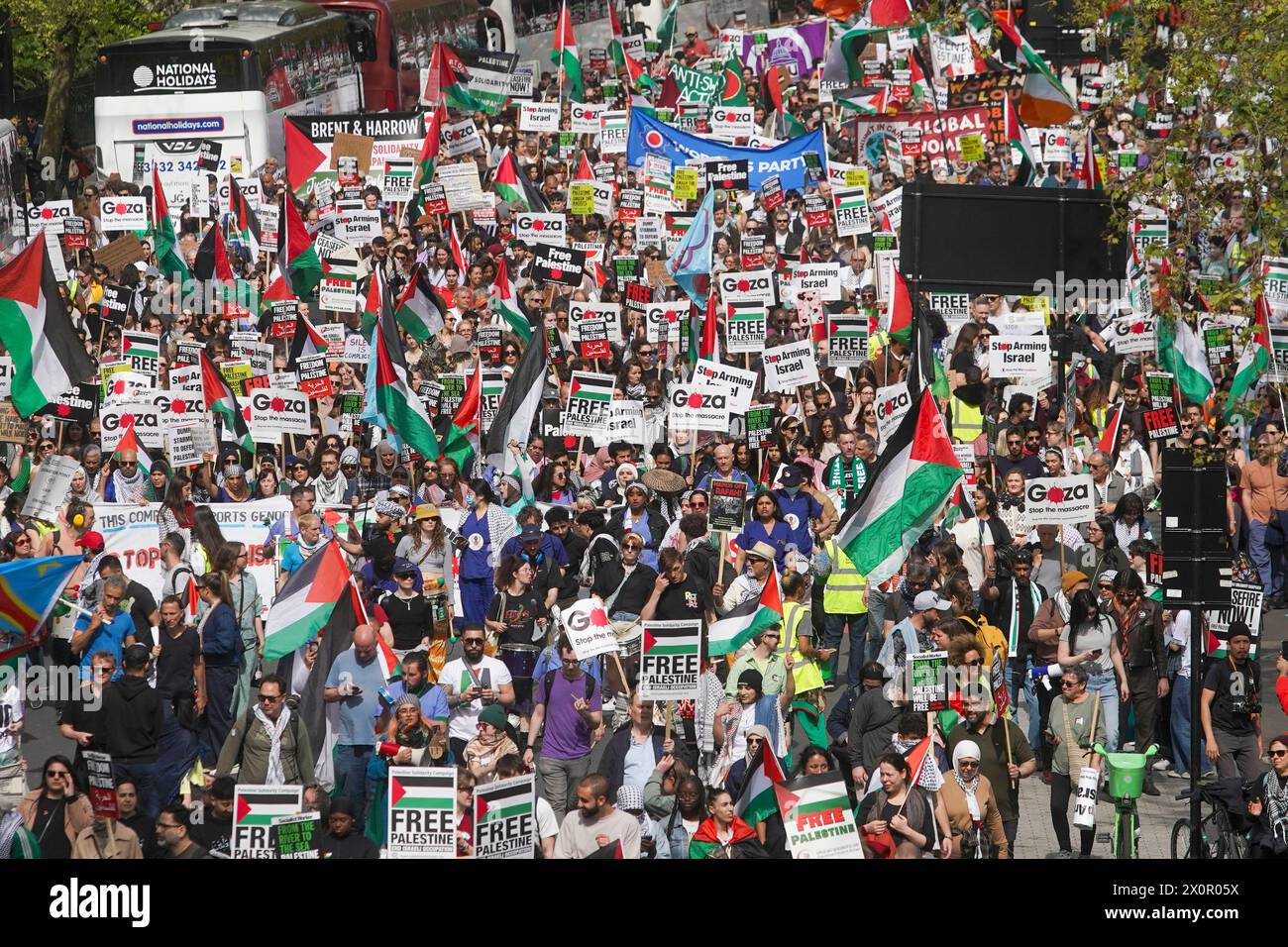 People take part in a pro-Palestine march in central London organised