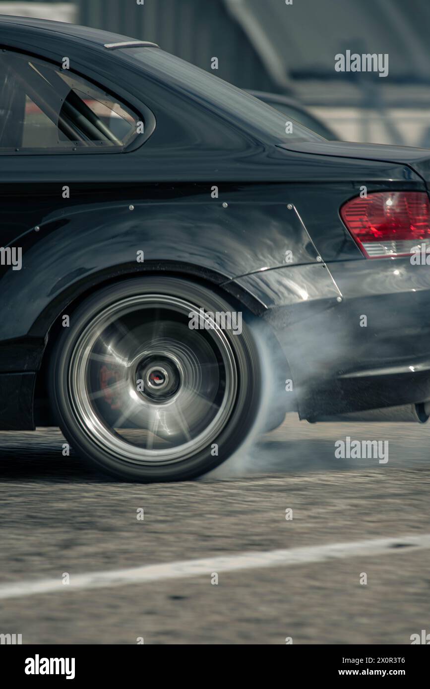 Car make tyre burnout in drift competition Stock Photo