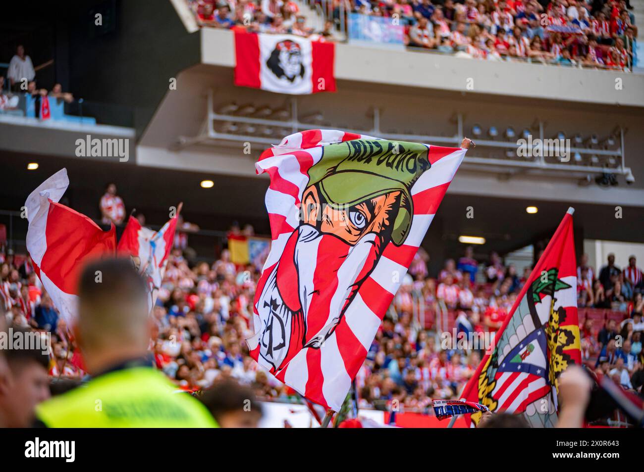 Madrid, Madrid, Spain. 13th Apr, 2024. Atletico Madrid fans choreography flags during the La Liga EA Sports football match between Atletico Madrid and Girona FC at Estadio Civitas Metropolitano on April 13, 2024 in Madrid, Spain. (Credit Image: © Alberto Gardin/ZUMA Press Wire) EDITORIAL USAGE ONLY! Not for Commercial USAGE! Stock Photo