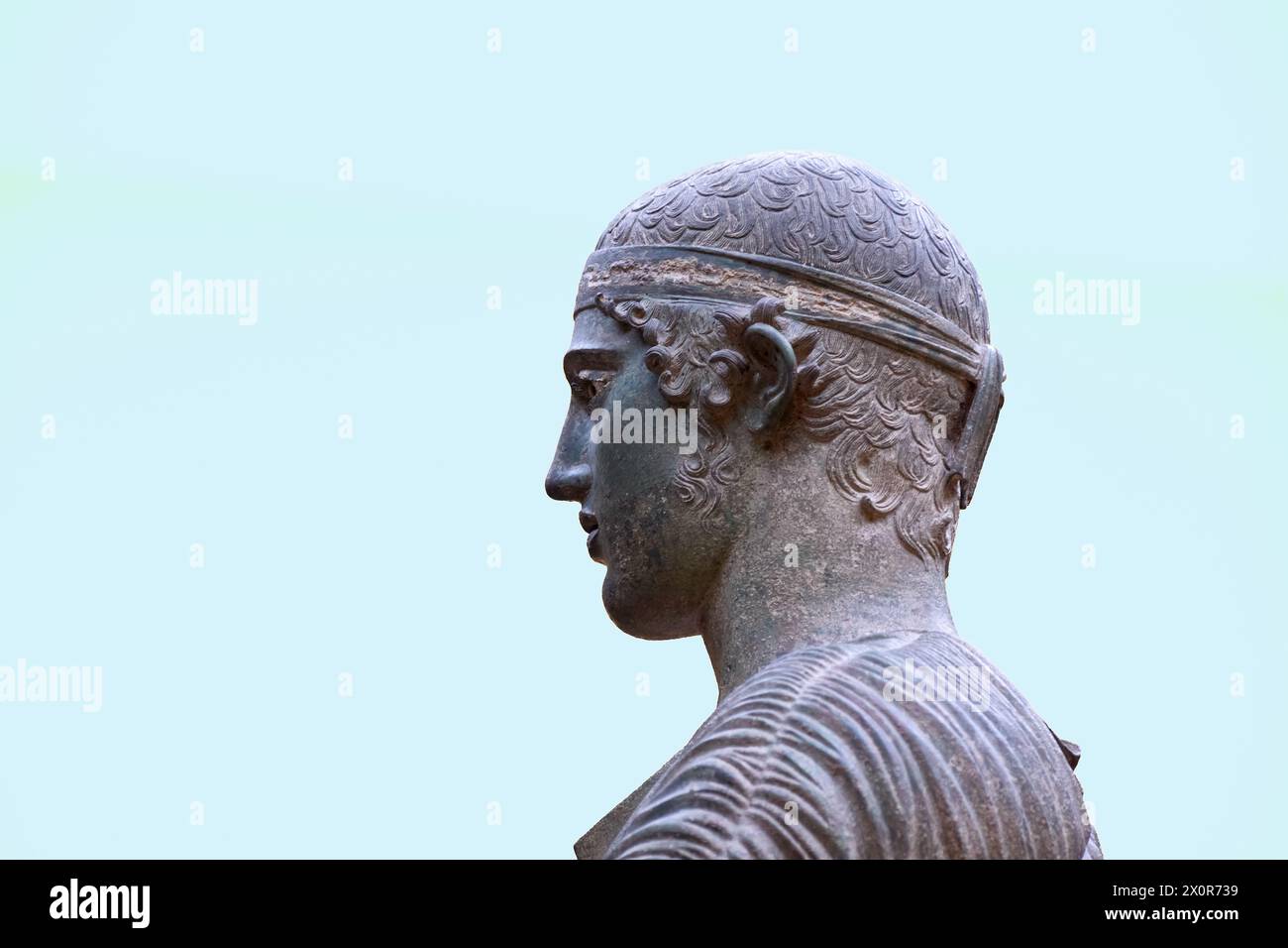 Statue of the Charioteer of Delphi at Delphi Museum. Built of bronze in 474 B.C. to commemorate a chariot team victory at the Pythian Games it is high Stock Photo