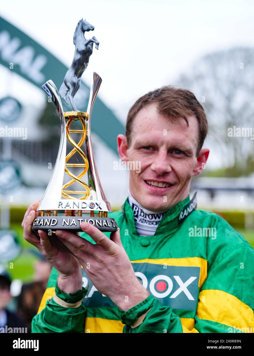 Jockey Paul Townend with the trophy after winning the Randox Grand