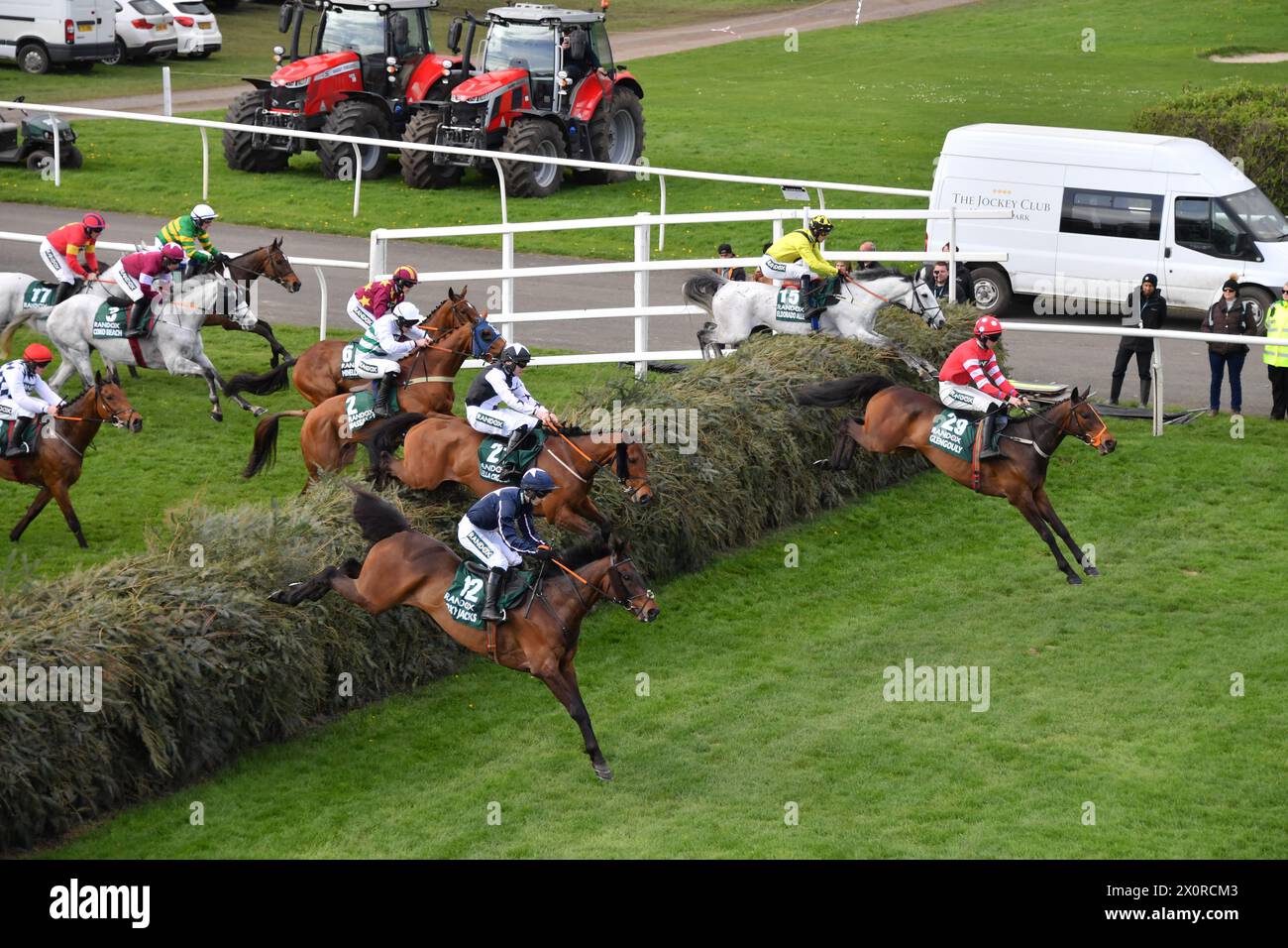 Liverpool, UK, 12th Apr, 2024. The leaders jump the third in The Grand National at Aintree. Photo Credit: Paul Blake/Alamy Sports News Stock Photo