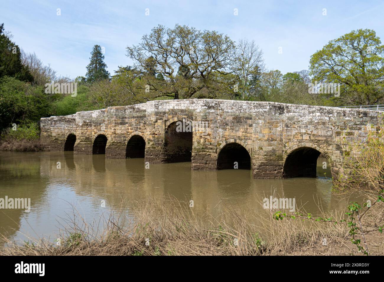 Stopham Bridge, West Sussex, England, UK, across the River Arun, a pretty medieval seven arched stone bridge that is a grade I listed building Stock Photo