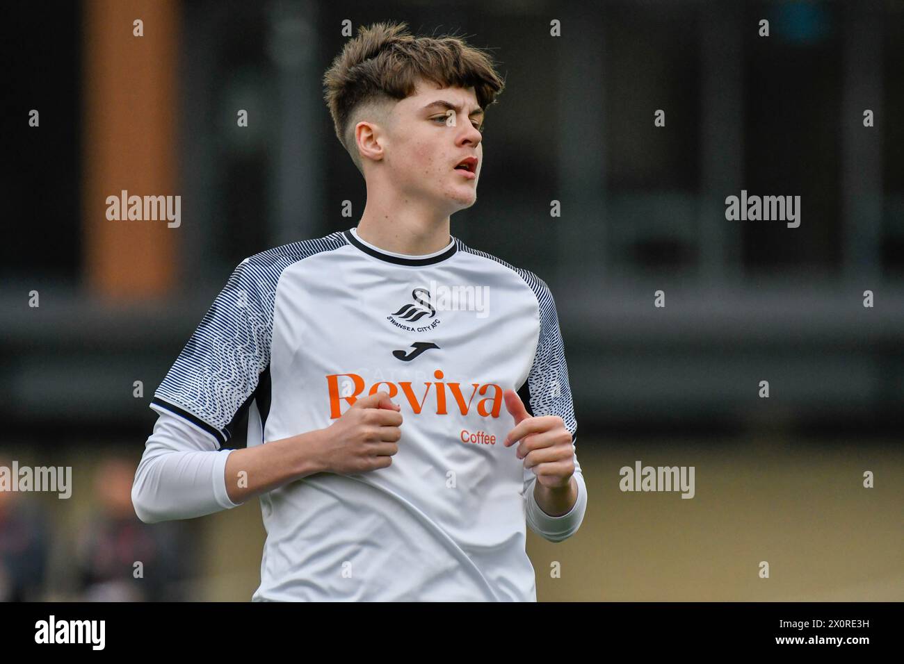 Landore, Swansea, Wales. 13 April 2024. Harvey Gray of Swansea City during the Under 18 Professional Development League match between Swansea City and Burnley at the Swansea City Academy in Landore, Swansea, Wales, UK on 13 April 2024. Credit: Duncan Thomas/Majestic Media/Alamy Live News. Stock Photo