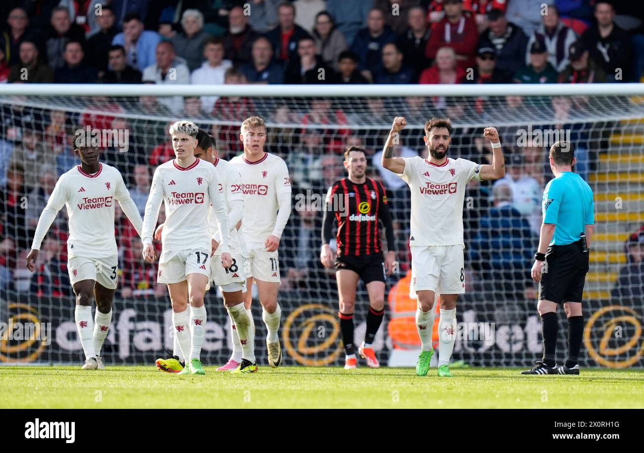 Manchester United's Bruno Fernandes (second right) celebrates scoring their side's first goal of the game during the Premier League match at the Vitality Stadium, Bournemouth. Picture date: Saturday April 13, 2024. Stock Photo