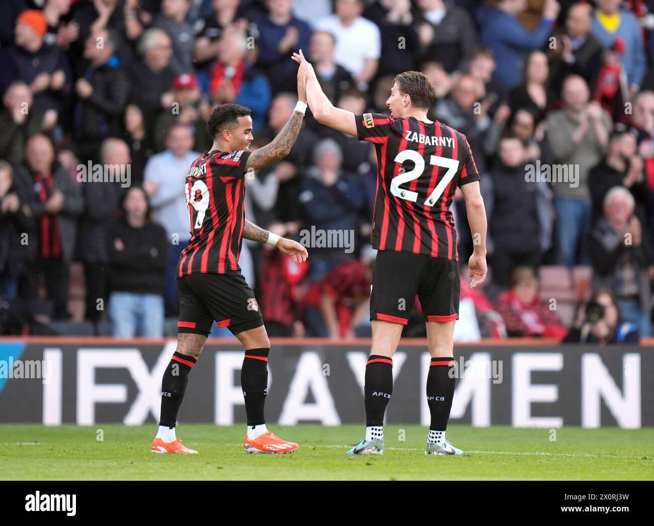 Bournemouth's Justin Kluivert (left) celebrates scoring their side's second goal of the game during the Premier League match at the Vitality Stadium, Bournemouth. Picture date: Saturday April 13, 2024. Stock Photo