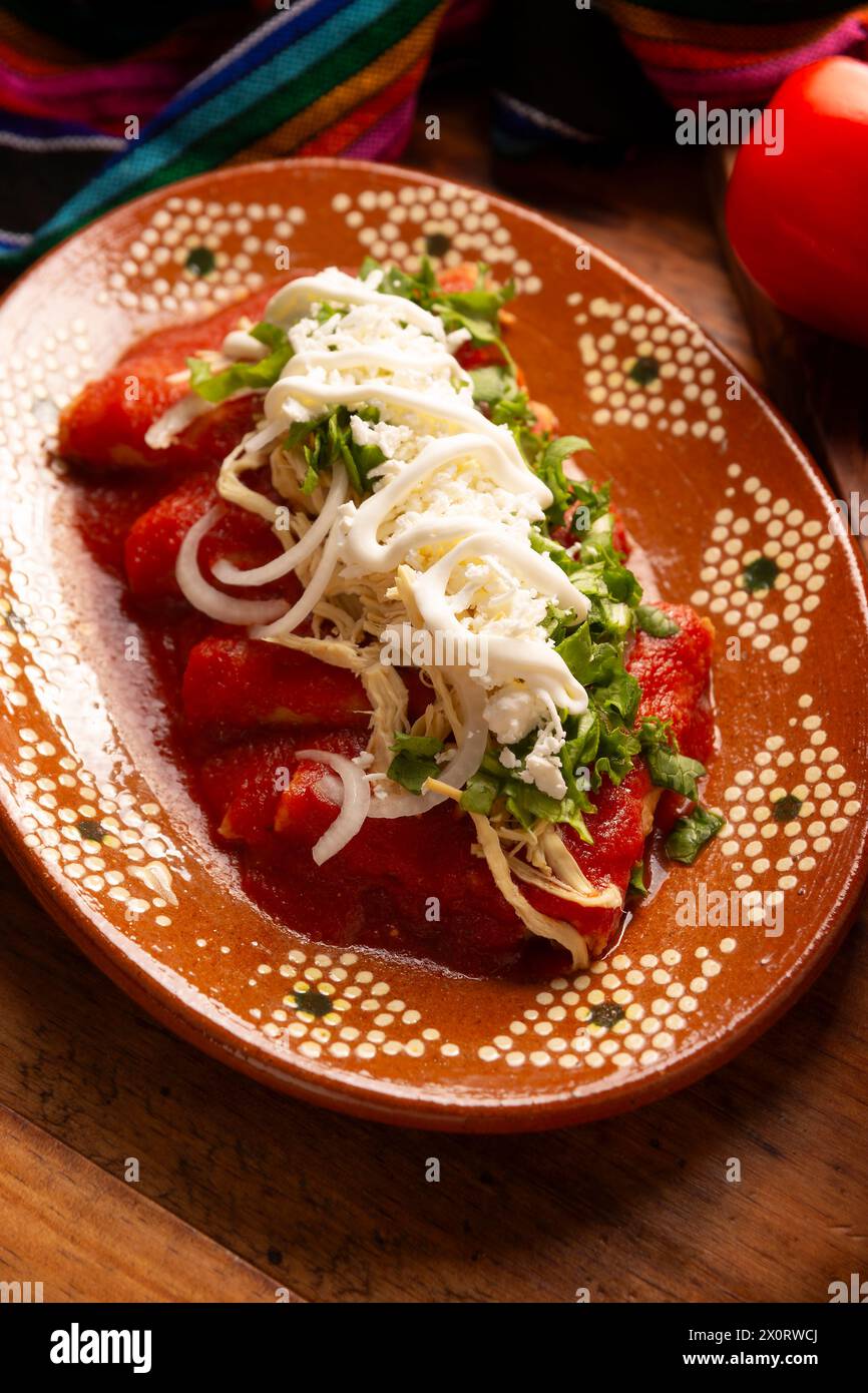 Entomatadas. Also known as Enjitomatadas, a typical dish of Mexican cuisine prepared with corn